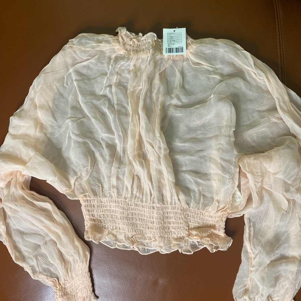 Urban outfitters ruffle neck and ruffle waist blouse